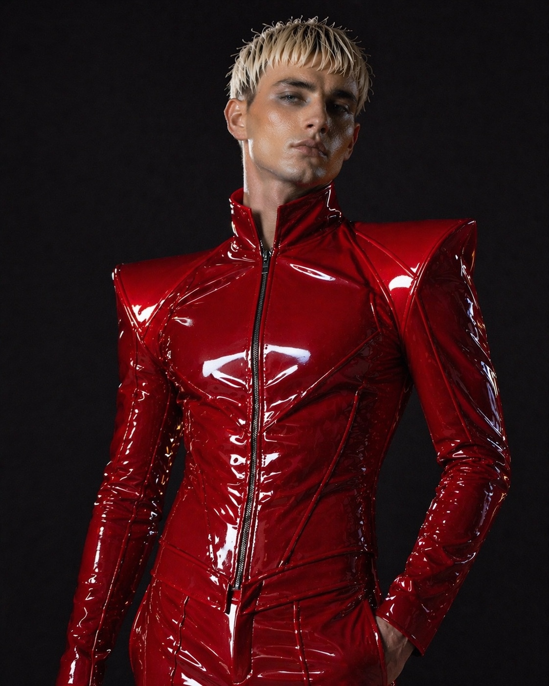 Charlie Void in structured red patent tailoring